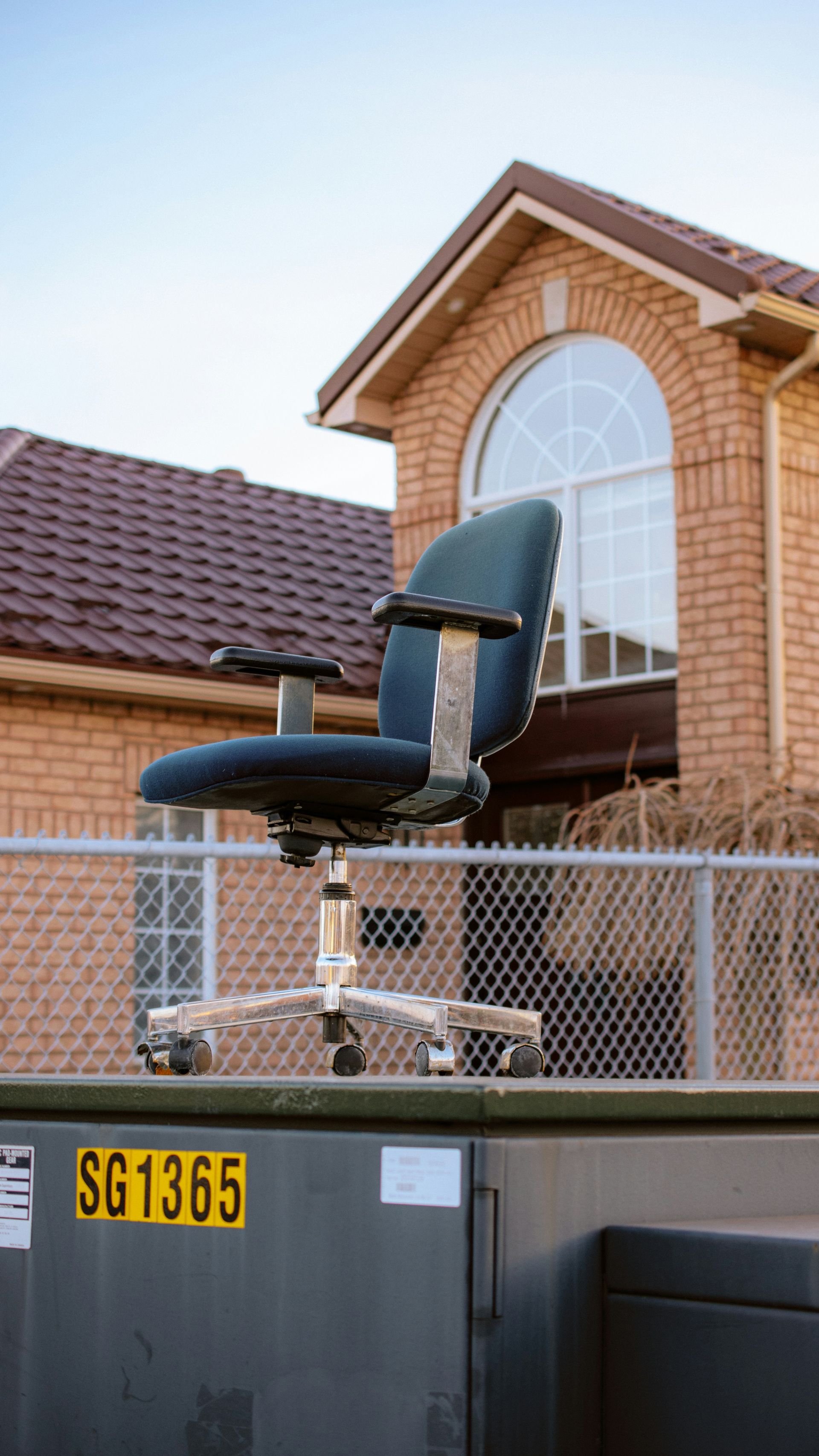 a chair sitting on top of a metal box